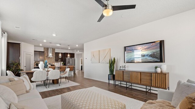 4114 Silver Springs Rd NE, Rio Rancho, NM 87144 - living room with wood finished floors, recessed lighting, a ceiling fan, and baseboards