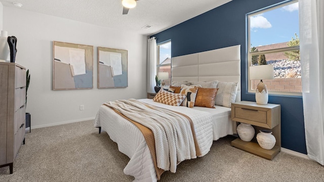 4114 Silver Springs Rd NE, Rio Rancho, NM 87144 - carpeted bedroom with ceiling fan and baseboards