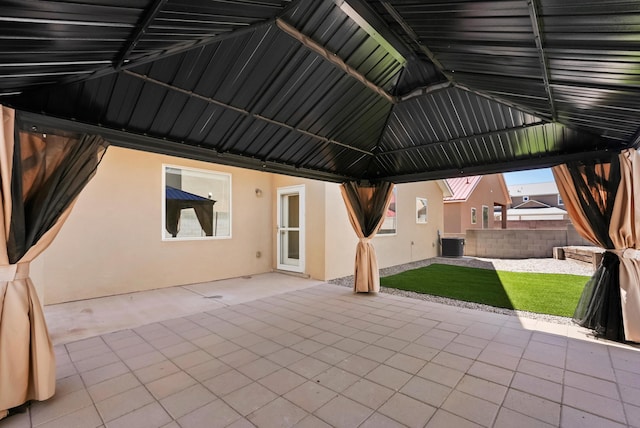 view of patio / terrace with a gazebo and cooling unit