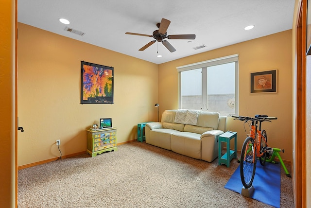 6119 La Paz Rd NE, Rio Rancho, NM 87144 - carpeted living room with a ceiling fan and baseboards