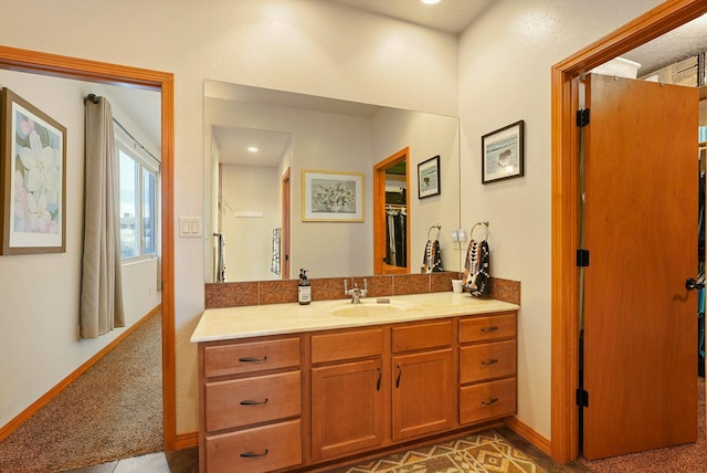 6119 La Paz Rd NE, Rio Rancho, NM 87144 - bathroom featuring vanity and baseboards