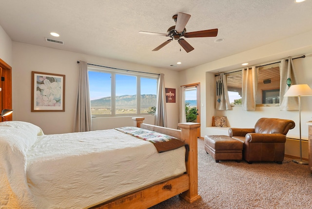 6119 La Paz Rd NE, Rio Rancho, NM 87144 - carpeted bedroom featuring recessed lighting, a mountain view, and a ceiling fan