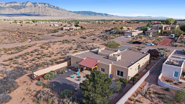 6119 La Paz Rd NE, Rio Rancho, NM 87144 - aerial view of sparsely populated area with a mountainous background and a desert landscape