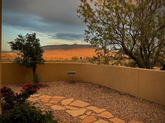 6119 La Paz Rd NE, Rio Rancho, NM 87144 - view of patio featuring a mountain view