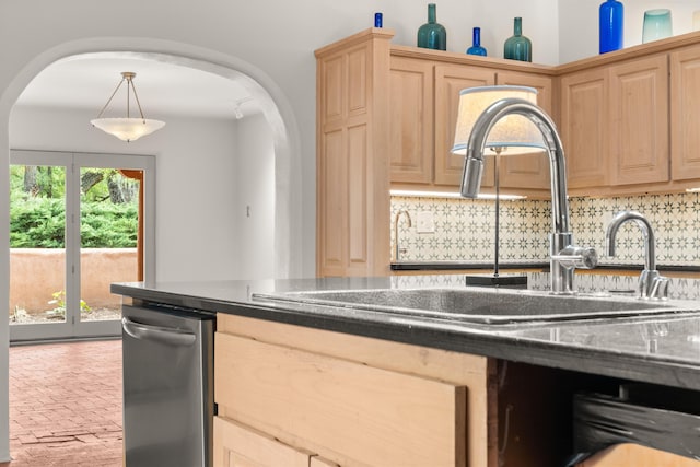 384 Chaparral Ln, Corrales, NM 87048 - kitchen featuring arched walkways, light brown cabinets, backsplash, and brick patterned floors
