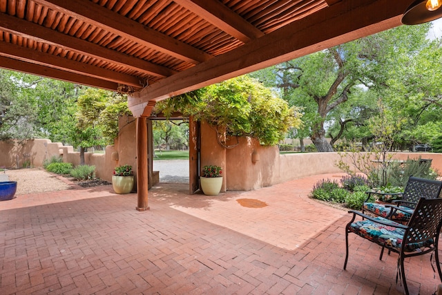 384 Chaparral Ln, Corrales, NM 87048 - view of patio / terrace with fence