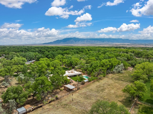384 Chaparral Ln, Corrales, NM 87048 - bird's eye view of a heavily wooded area and mountains