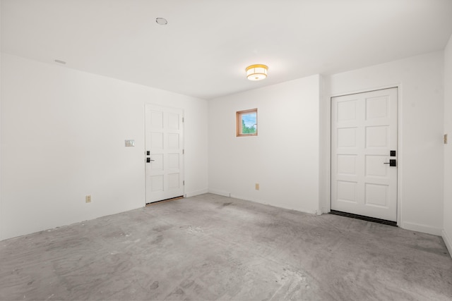 384 Chaparral Ln, Corrales, NM 87048 - empty room with unfinished concrete floors