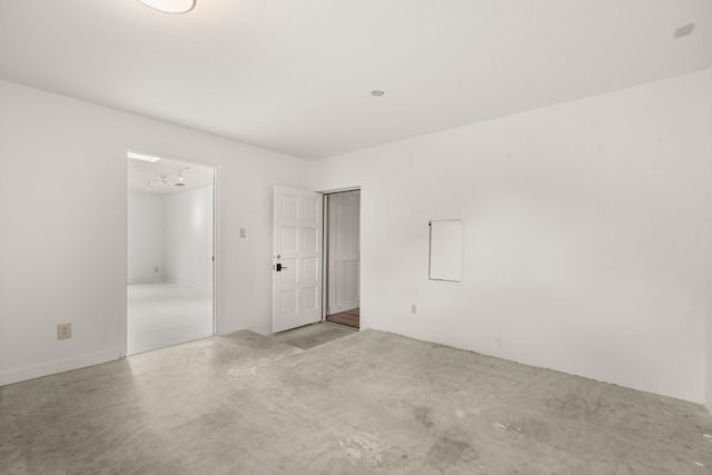 384 Chaparral Ln, Corrales, NM 87048 - unfurnished bedroom featuring concrete floors