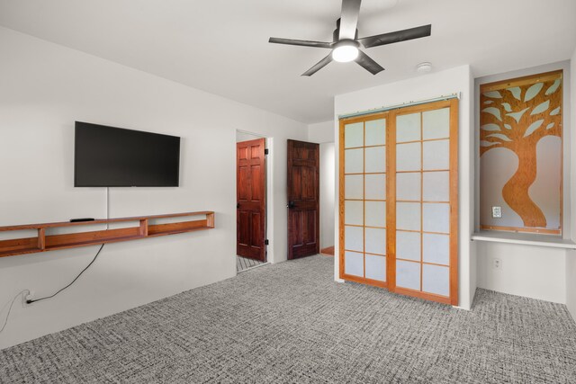 384 Chaparral Ln, Corrales, NM 87048 - unfurnished living room featuring ceiling fan and carpet floors