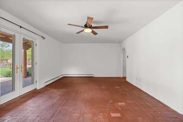 384 Chaparral Ln, Corrales, NM 87048 - spare room with arched walkways, ceiling fan, brick flooring, and a baseboard radiator