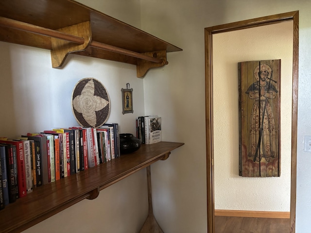 37 Lasso Ln, Pie Town, NM 87827 - corridor with baseboards and wood finished floors
