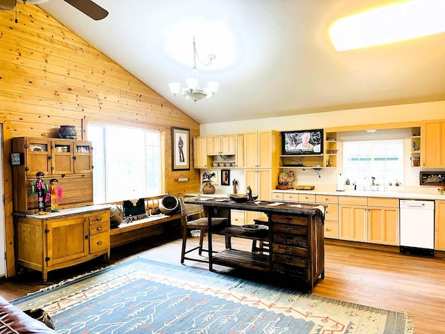 37 Lasso Ln, Pie Town, NM 87827 - kitchen featuring white dishwasher, open shelves, lofted ceiling, light wood-type flooring, and a chandelier