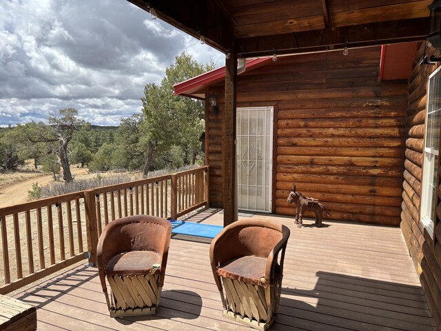 37 Lasso Ln, Pie Town, NM 87827 - view of wooden deck