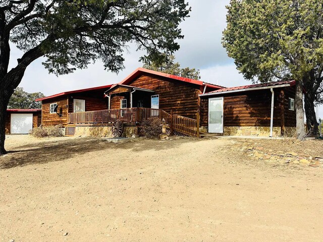 37 Lasso Ln, Pie Town, NM 87827 - view of front facade featuring a porch