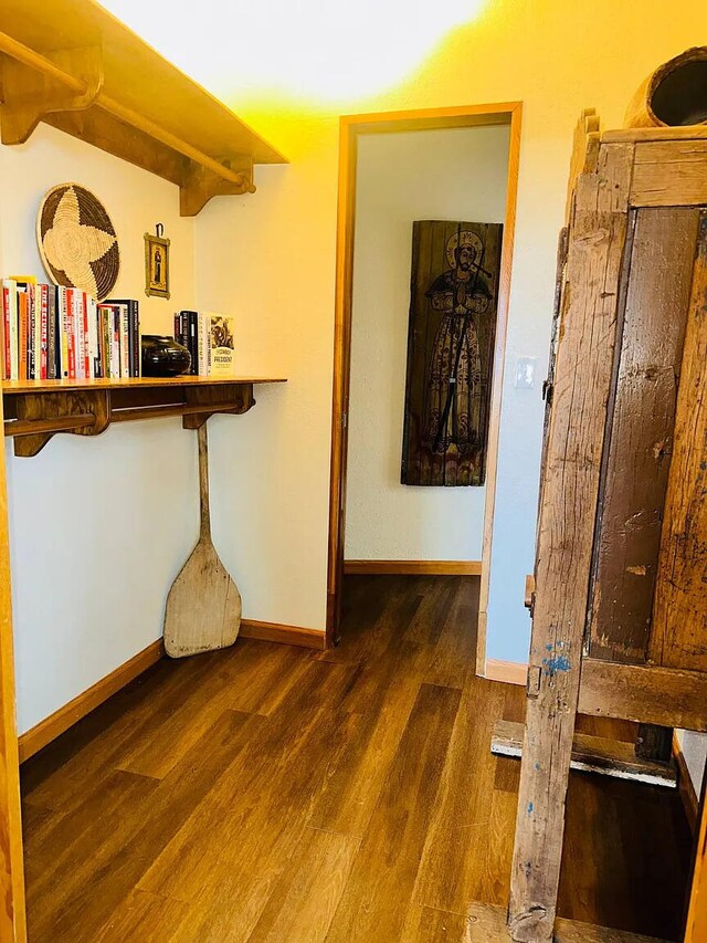 37 Lasso Ln, Pie Town, NM 87827 - hallway featuring wood finished floors and baseboards