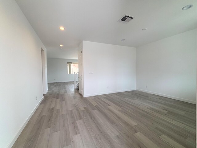 3234 Matador St SE, Rio Rancho, NM 87124 - spare room featuring dark carpet and recessed lighting
