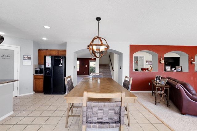1181 Colibri Ave NW, Los Lunas, NM 87031 - dining space featuring light tile patterned flooring, stairway, recessed lighting, a chandelier, and baseboards