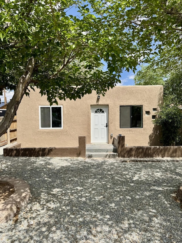 410 Utah St NE, Albuquerque, NM 87108 - view of front of property featuring stucco siding