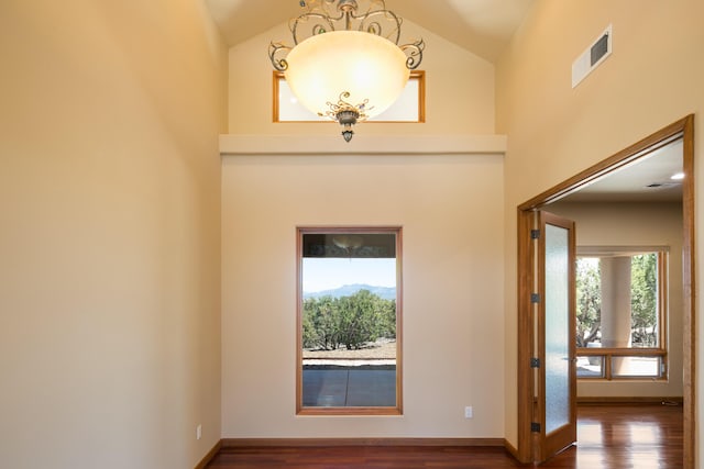 9 Canon Escondido, Sandia Park, NM 87047 - entryway featuring lofted ceiling, wood finished floors, and baseboards
