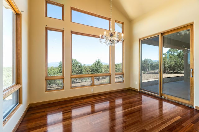 9 Canon Escondido, Sandia Park, NM 87047 - interior space with healthy amount of natural light, wood finished floors, and lofted ceiling