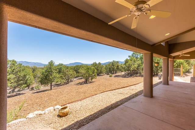 9 Canon Escondido, Sandia Park, NM 87047 - view of patio featuring ceiling fan and a mountain view