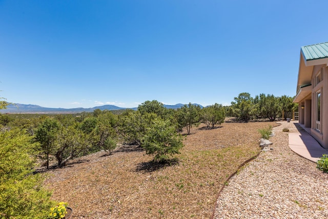 9 Canon Escondido, Sandia Park, NM 87047 - view of yard featuring a mountain view