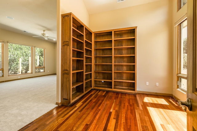 9 Canon Escondido, Sandia Park, NM 87047 - spare room with dark wood-style floors, a ceiling fan, and baseboards