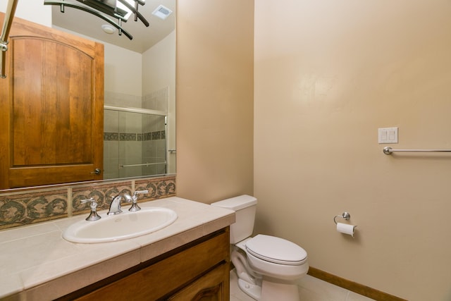9 Canon Escondido, Sandia Park, NM 87047 - full bath featuring a stall shower, toilet, tile patterned floors, vanity, and baseboards
