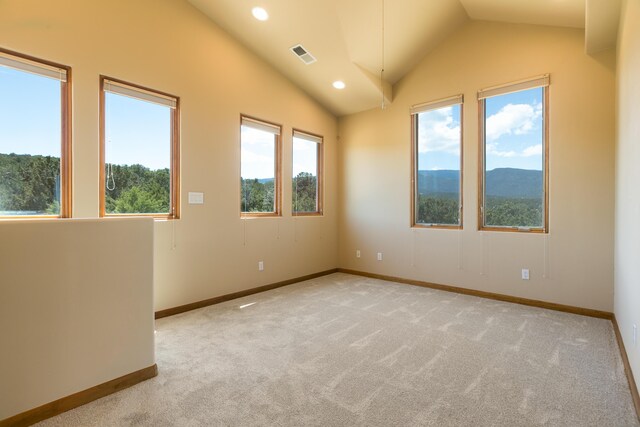9 Canon Escondido, Sandia Park, NM 87047 - carpeted empty room featuring lofted ceiling, baseboards, and recessed lighting