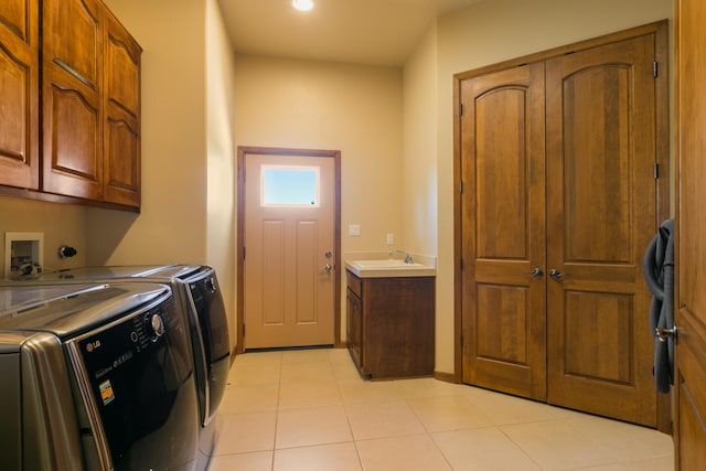 9 Canon Escondido, Sandia Park, NM 87047 - laundry room featuring cabinet space, independent washer and dryer, light tile patterned floors, and recessed lighting