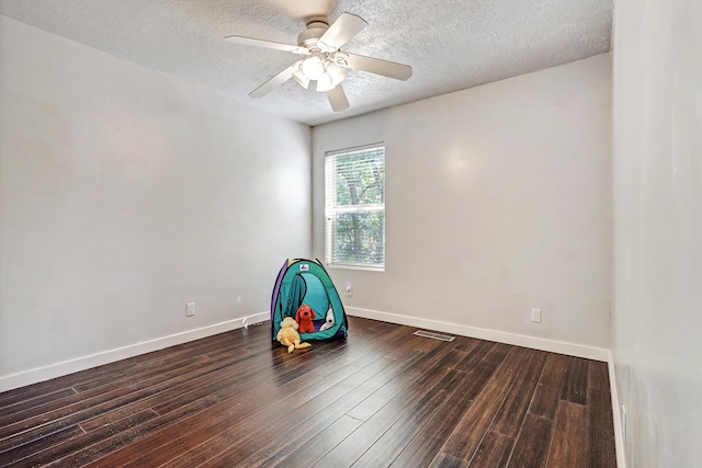 5209 Sugarbear Ct, Albuquerque, NM 87120 - rec room with hardwood / wood-style floors, a textured ceiling, baseboards, and ceiling fan