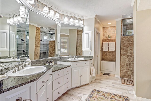 1513 Tinnin Rd NW, Los Ranchos, NM 87107 - full bath featuring tiled shower, double vanity, and ornamental molding