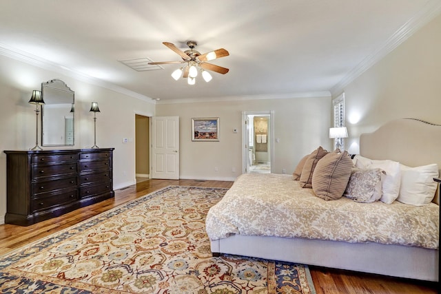 1513 Tinnin Rd NW, Los Ranchos, NM 87107 - bedroom featuring wood finished floors, ornamental molding, and ceiling fan