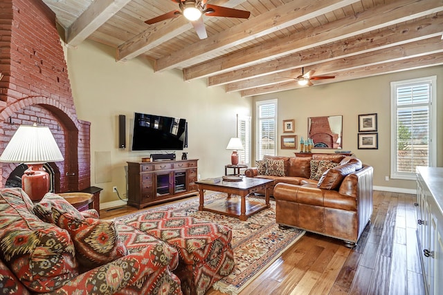 1513 Tinnin Rd NW, Los Ranchos, NM 87107 - living room featuring ceiling fan, a wooden ceiling with exposed beams, and wood-type flooring