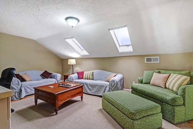 1513 Tinnin Rd NW, Los Ranchos, NM 87107 - living area featuring a skylight, vaulted ceiling, a textured ceiling, and carpet