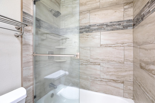 2308 Animas Ct NE, Rio Rancho, NM 87144 - bathroom featuring toilet and shower / bath combination with glass door