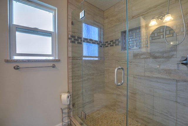2308 Animas Ct NE, Rio Rancho, NM 87144 - bathroom with healthy amount of natural light and a shower stall