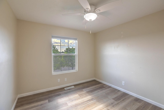 2308 Animas Ct NE, Rio Rancho, NM 87144 - empty room with light wood-type flooring, baseboards, and a ceiling fan
