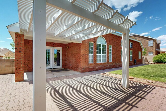 8720 Oakcrest Pl NW, Albuquerque, NM 87114 - view of patio featuring french doors and a pergola