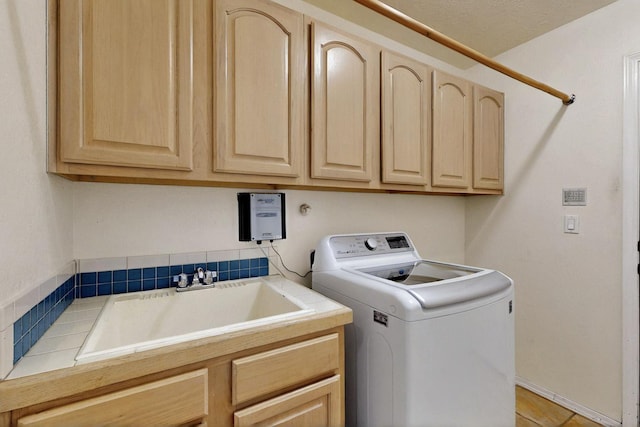 8720 Oakcrest Pl NW, Albuquerque, NM 87114 - laundry room with washer / clothes dryer and cabinet space