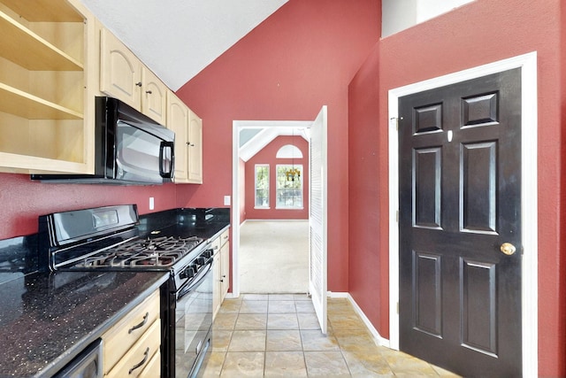 8720 Oakcrest Pl NW, Albuquerque, NM 87114 - kitchen with black appliances, vaulted ceiling, baseboards, light brown cabinets, and dark stone countertops