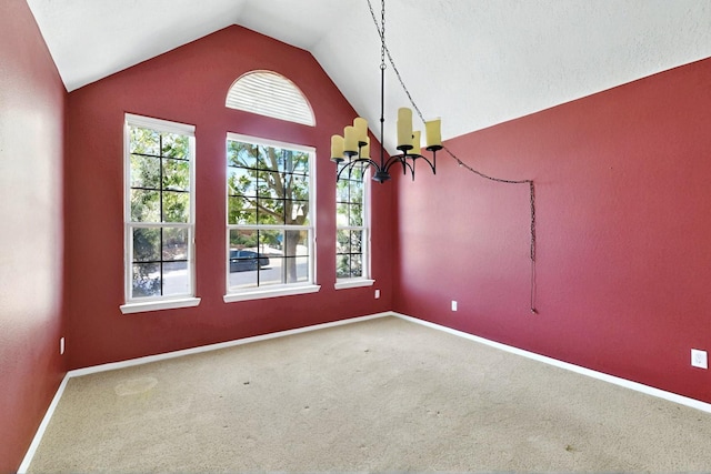 8720 Oakcrest Pl NW, Albuquerque, NM 87114 - unfurnished dining area with lofted ceiling, a chandelier, carpet flooring, and baseboards