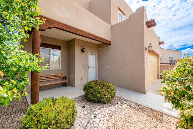 10500 Trieste Ct NW, Albuquerque, NM 87114 - entrance to property featuring stucco siding