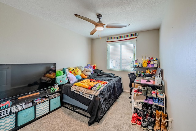 10500 Trieste Ct NW, Albuquerque, NM 87114 - bedroom with carpet, a textured ceiling, and a ceiling fan
