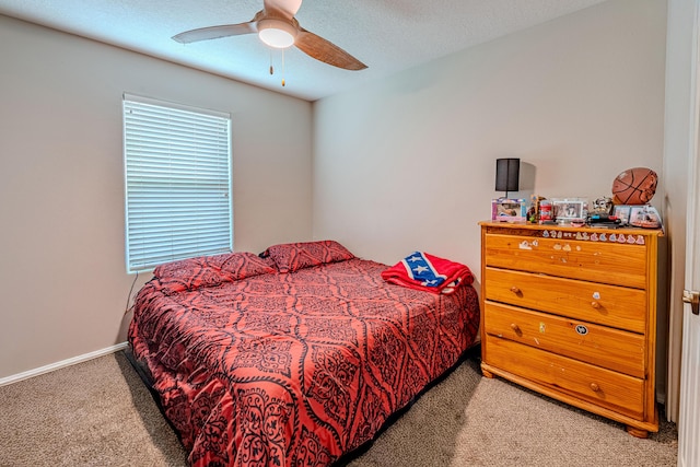 10500 Trieste Ct NW, Albuquerque, NM 87114 - bedroom with carpet flooring, ceiling fan, and baseboards