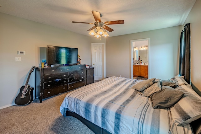 10500 Trieste Ct NW, Albuquerque, NM 87114 - carpeted bedroom featuring a ceiling fan, ensuite bath, and baseboards