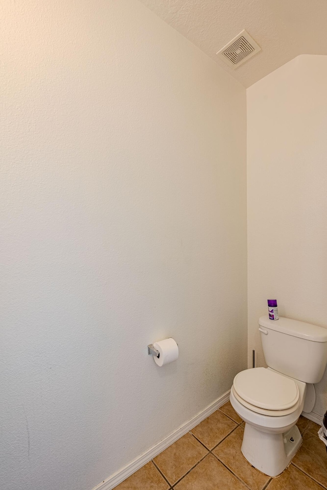 10500 Trieste Ct NW, Albuquerque, NM 87114 - bathroom featuring tile patterned floors, toilet, and baseboards