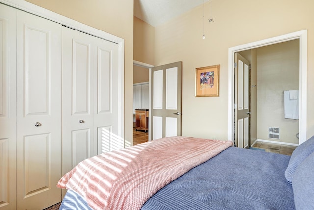 351 Washington St SE Unit 102, Albuquerque, NM 87108 - bedroom with a closet, baseboards, and tile patterned floors