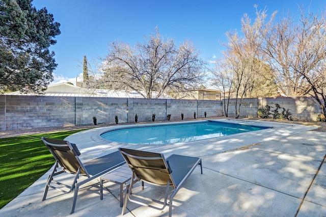 6507 Loftus Ave NE, Albuquerque, NM 87109 - view of swimming pool with a fenced backyard and a patio area
